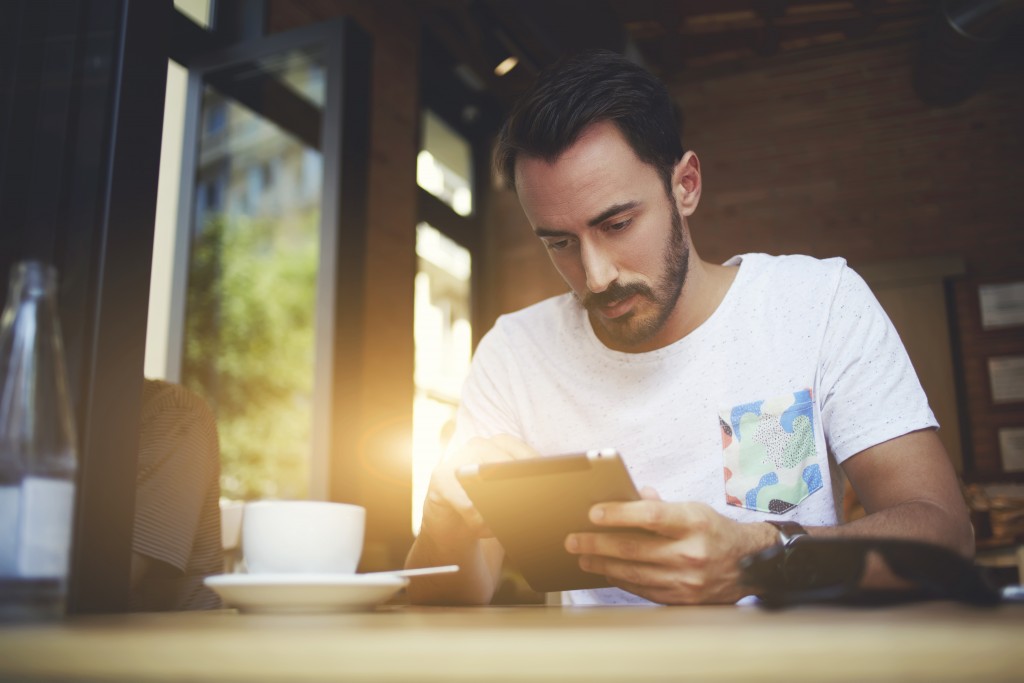 man checking his schedule