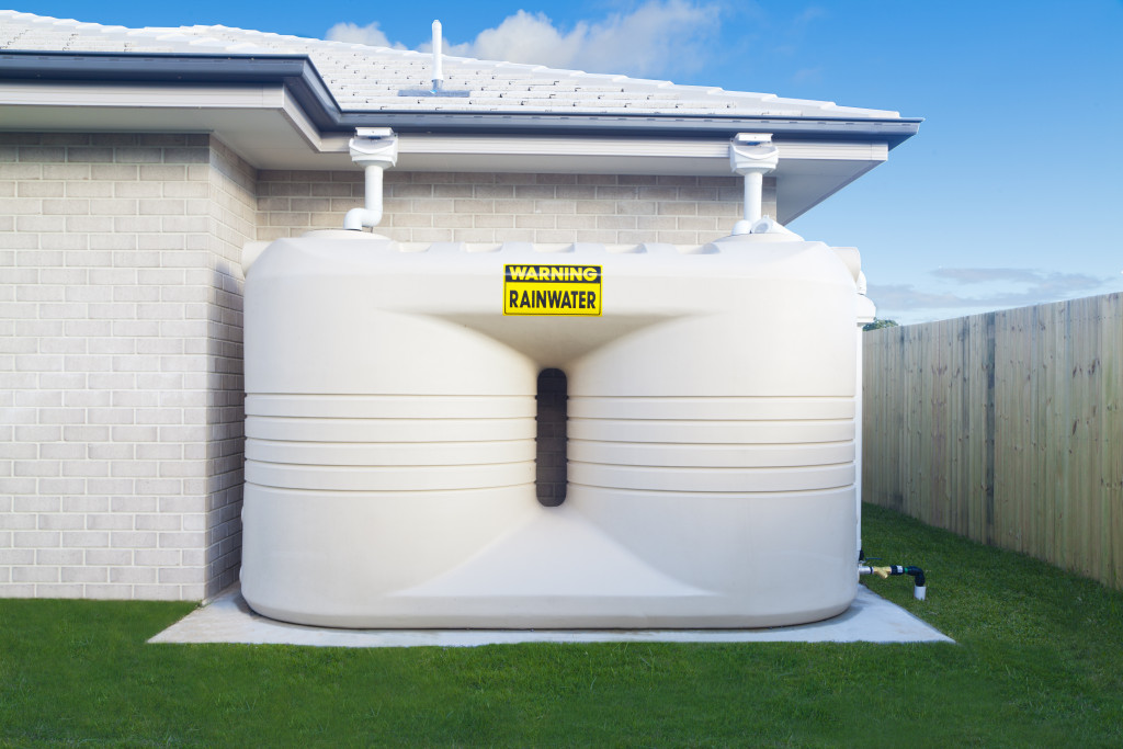 rainwater collection system in a house's backyard