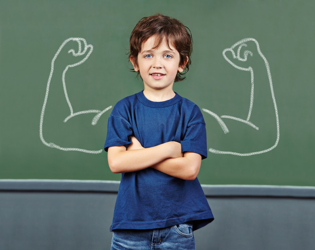 Arms around child showing self-esteem