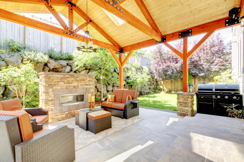 exterior covered patio with fireplace