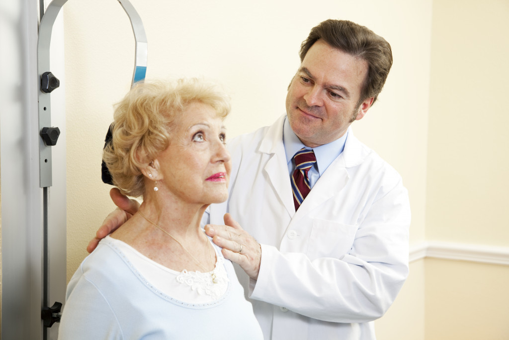 An elderly woman getting a medical checkup