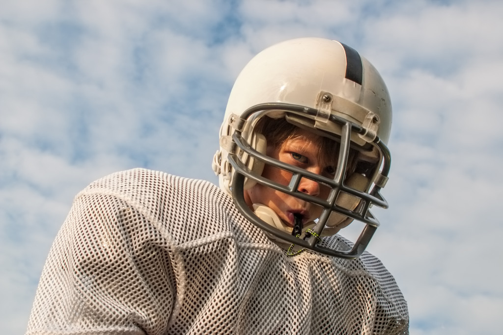 wearing football helment